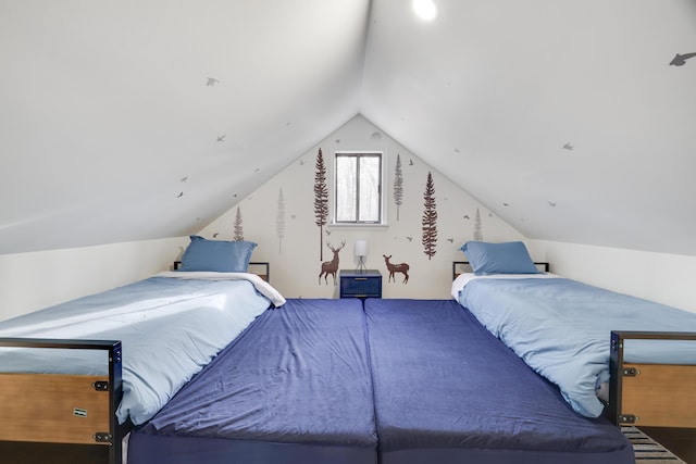 bedroom featuring vaulted ceiling