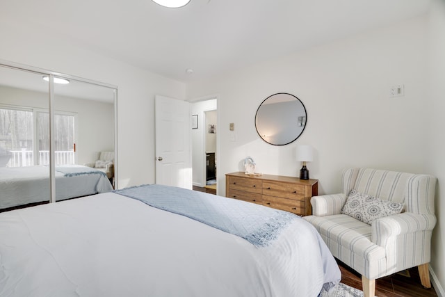 bedroom with a closet and wood finished floors