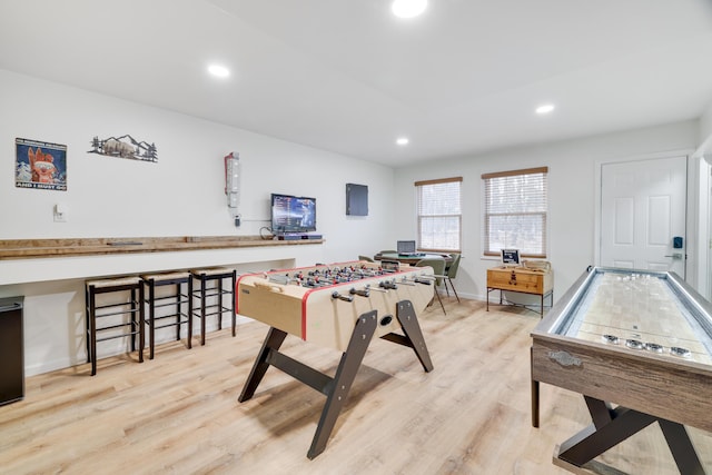 playroom featuring recessed lighting, light wood-style flooring, and baseboards