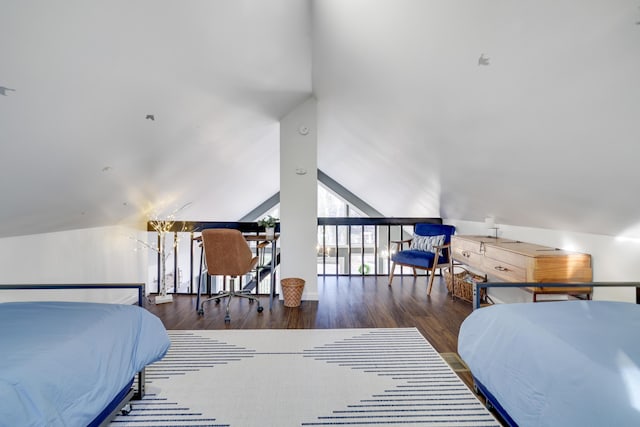 bedroom featuring vaulted ceiling and wood finished floors