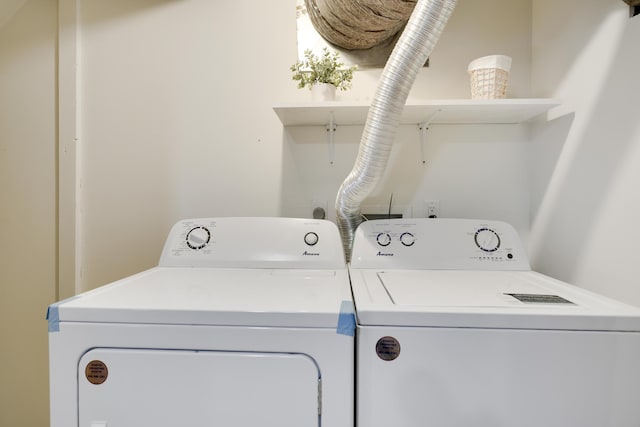 laundry area with laundry area and independent washer and dryer