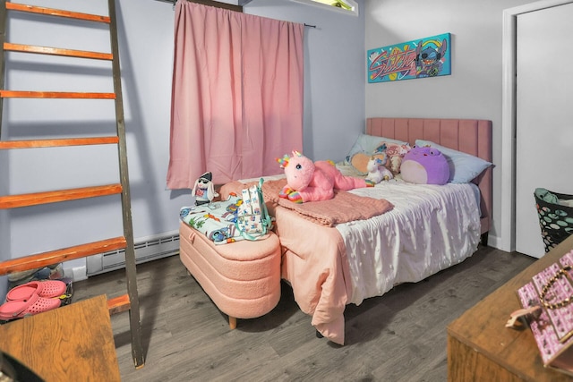 1900 Horseshoe Bnd, Tobyhanna, PA 18466 - bedroom with baseboard heating and wood finished floors