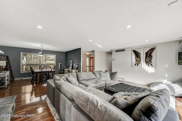 living room featuring dark hardwood / wood-style flooring