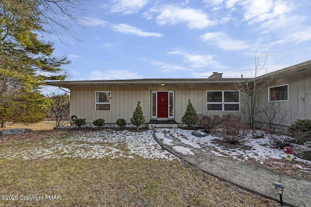 ranch-style house with a front yard