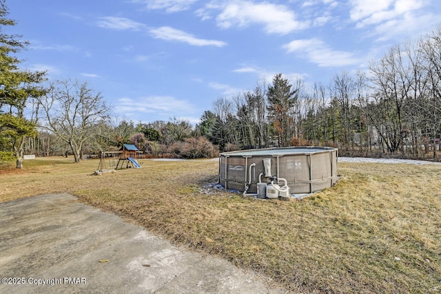 view of yard featuring a playground