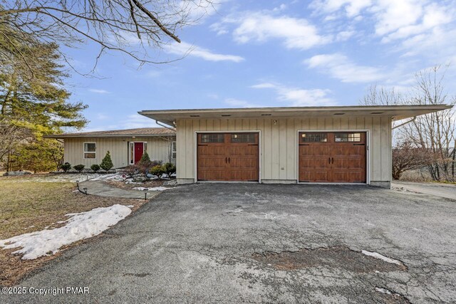 exterior space with a garage