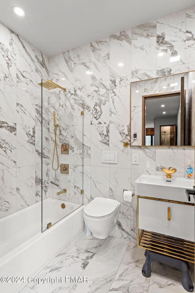 full bath featuring marble finish floor, toilet, vanity, and shower / bathtub combination