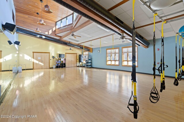 interior space featuring baseboards and ceiling fan