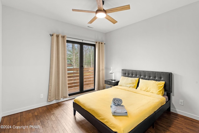 bedroom with baseboards, visible vents, wood-type flooring, and ceiling fan