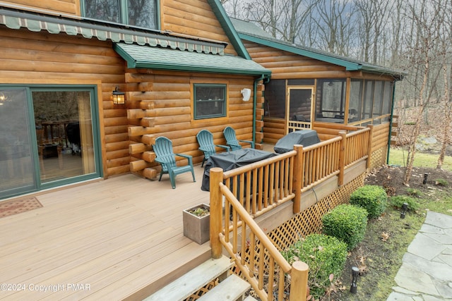 1212 Acacia Dr, Hawley, PA 18428 - wooden deck with a sunroom