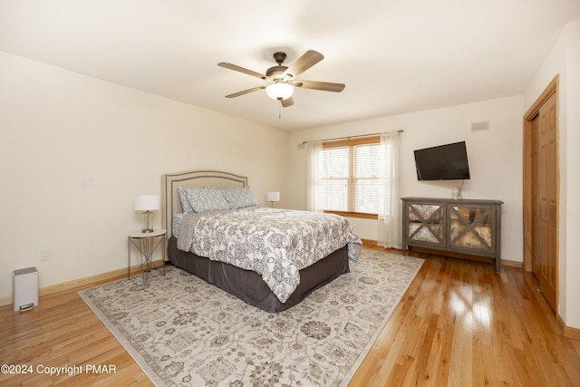 1212 Acacia Dr, Hawley, PA 18428 - bedroom featuring light wood-type flooring, baseboards, and ceiling fan