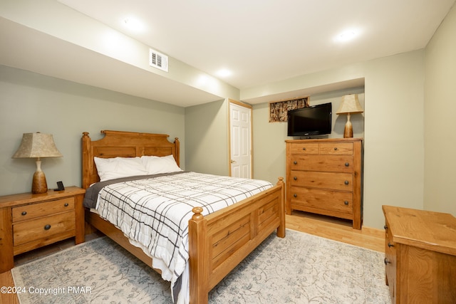 1212 Acacia Dr, Hawley, PA 18428 - bedroom featuring visible vents and light wood-style flooring