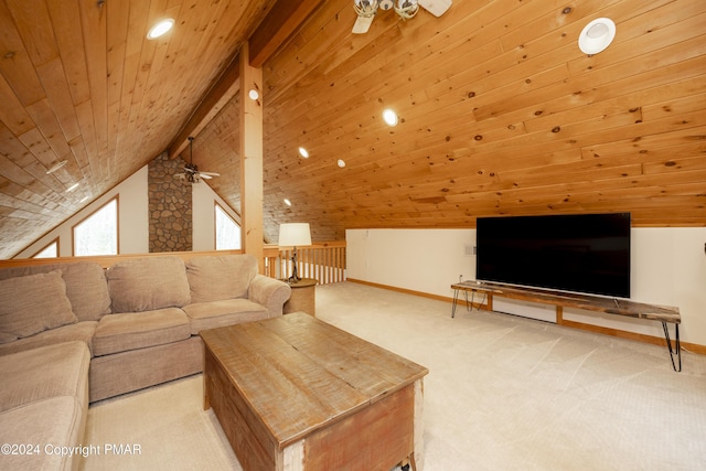 1212 Acacia Dr, Hawley, PA 18428 - carpeted living room featuring wood ceiling, vaulted ceiling with beams, a ceiling fan, and baseboards