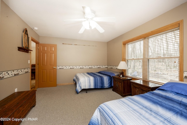 1212 Acacia Dr, Hawley, PA 18428 - bedroom featuring a ceiling fan and carpet