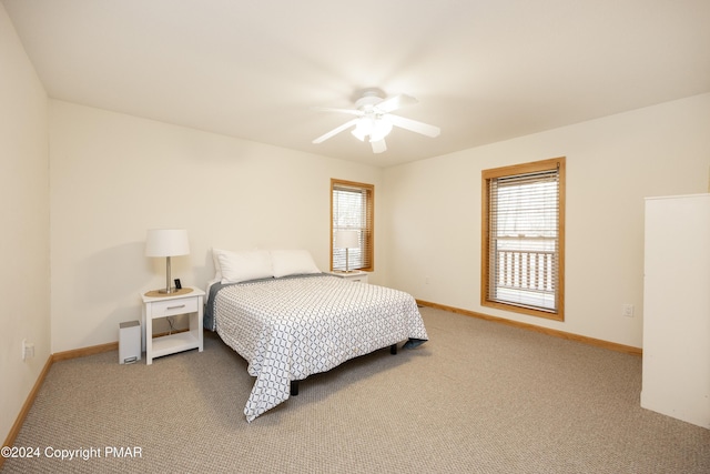 1212 Acacia Dr, Hawley, PA 18428 - carpeted bedroom with a ceiling fan and baseboards