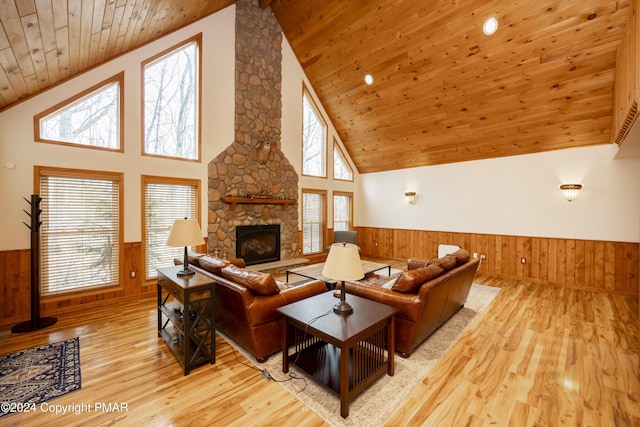 1212 Acacia Dr, Hawley, PA 18428 - living room featuring a wainscoted wall, wood walls, wood ceiling, and wood finished floors