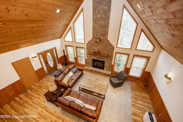 1212 Acacia Dr, Hawley, PA 18428 - living room with wooden ceiling, wood finished floors, and high vaulted ceiling