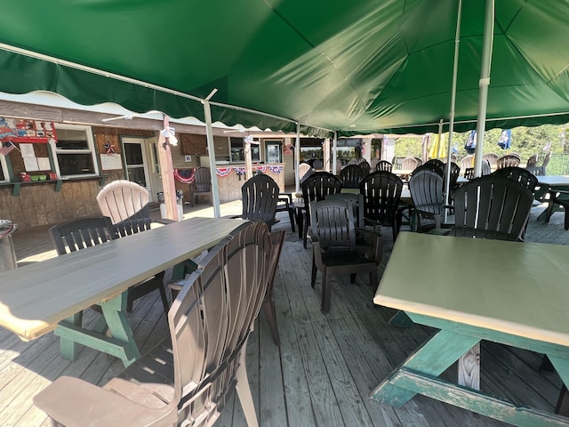 wooden deck with outdoor dining space