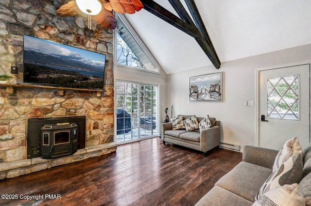 living room featuring hardwood / wood-style floors, high vaulted ceiling, beamed ceiling, a wood stove, and baseboard heating