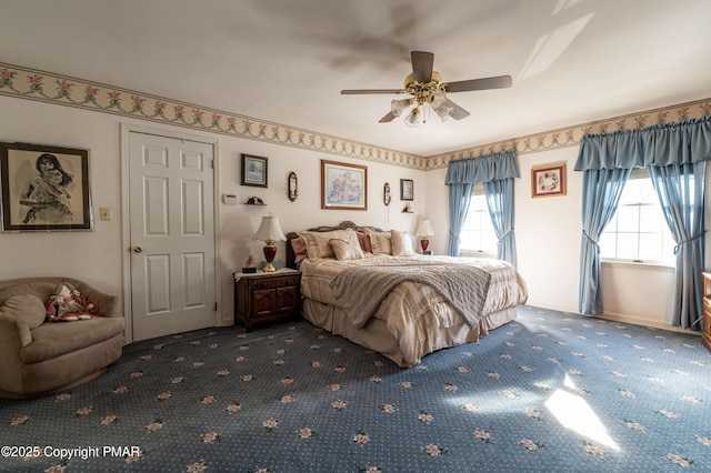 carpeted bedroom with ceiling fan