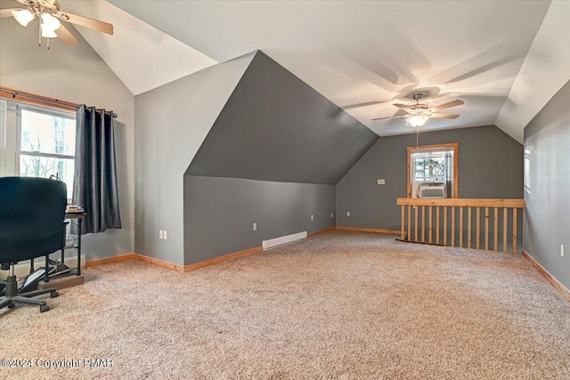 additional living space featuring lofted ceiling, cooling unit, carpet flooring, a ceiling fan, and baseboards