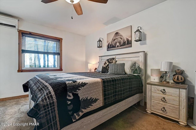 bedroom featuring a ceiling fan, carpet, a wall unit AC, and baseboards