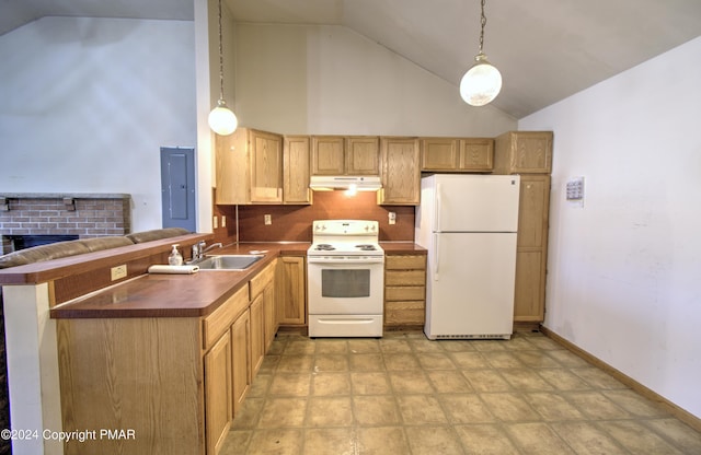 kitchen with white appliances, dark countertops, a peninsula, under cabinet range hood, and a sink