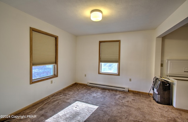 unfurnished room featuring baseboards, carpet flooring, a textured ceiling, and baseboard heating