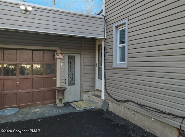 entrance to property with a garage