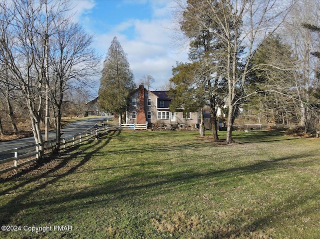 view of yard with fence