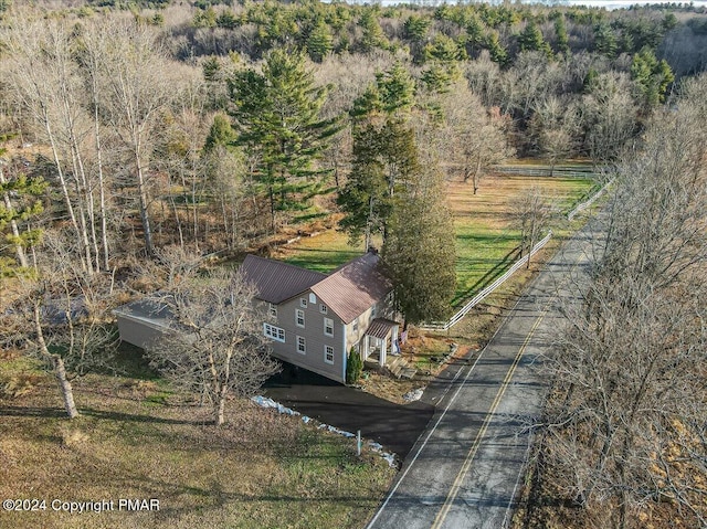 bird's eye view featuring a view of trees