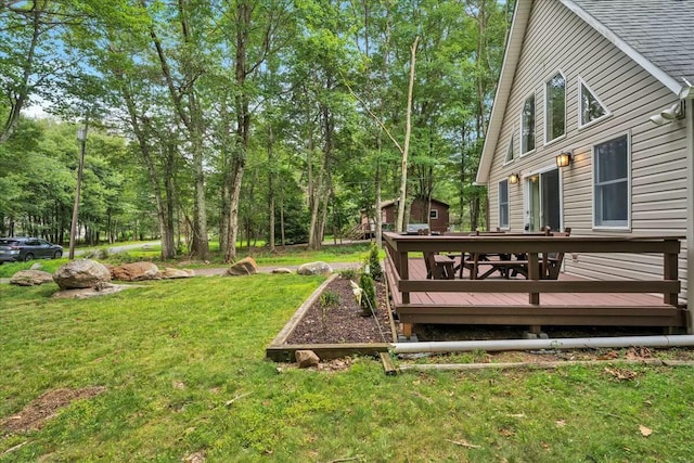 view of yard featuring a wooden deck