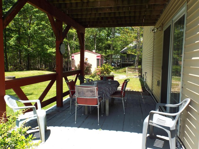 115 Gap View Rd, Milford, PA 18337 - wooden terrace featuring outdoor dining area and a yard
