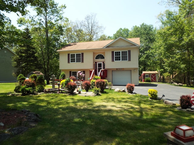 115 Gap View Rd, Milford, PA 18337 - split foyer home featuring asphalt driveway, a garage, and a front lawn