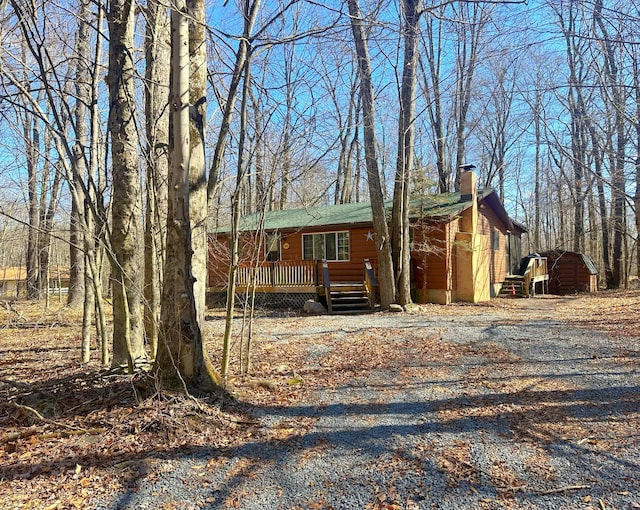 view of front of house with a chimney