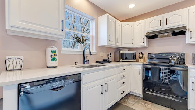 kitchen with a sink, black appliances, light countertops, under cabinet range hood, and white cabinetry