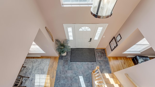 entryway with a towering ceiling