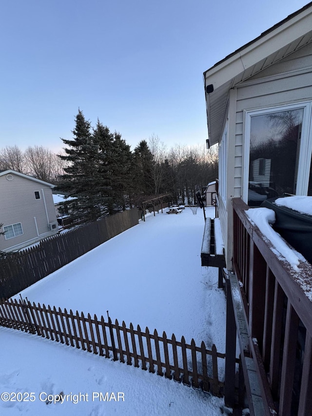 view of yard covered in snow