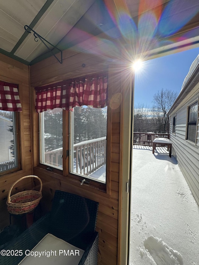 sunroom with plenty of natural light