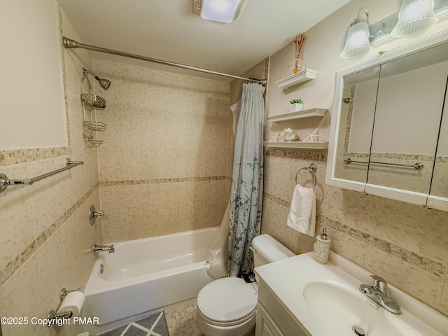 full bathroom featuring tile walls, vanity, toilet, and shower / bathtub combination with curtain