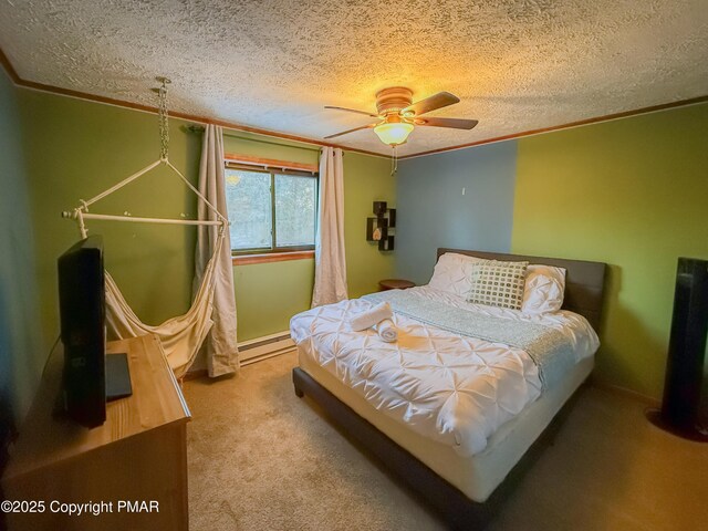 bedroom featuring crown molding, a textured ceiling, a baseboard radiator, ceiling fan, and carpet