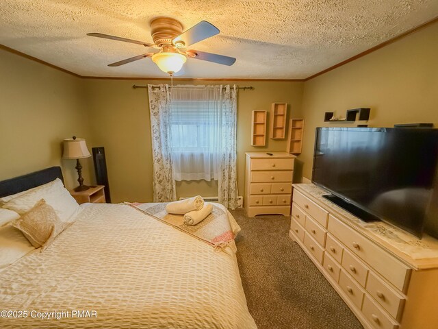 bedroom featuring ceiling fan, ornamental molding, carpet, and a textured ceiling