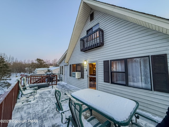 exterior space featuring cooling unit and a wooden deck