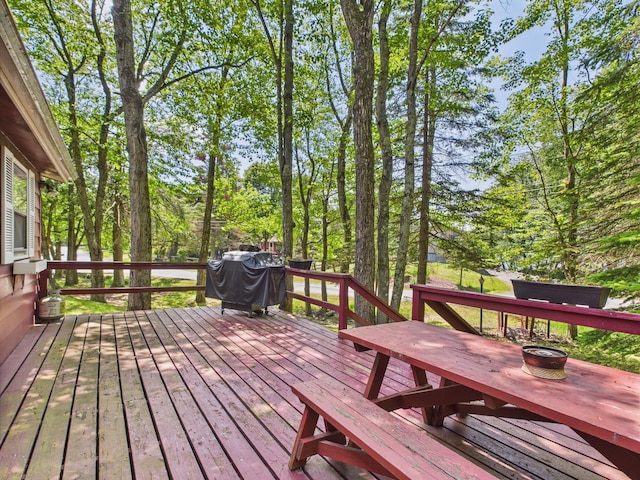 105 Buffalo Trl, Pocono Lake, PA 18347 - wooden terrace with a fire pit and area for grilling