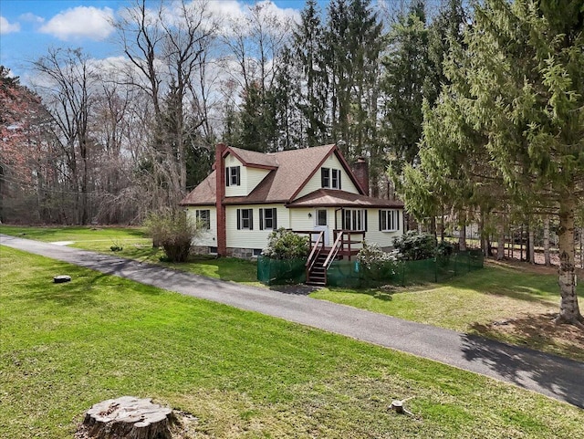 253 Thomas Rd, Blakeslee, PA 18610 - view of front facade with a chimney and a front yard