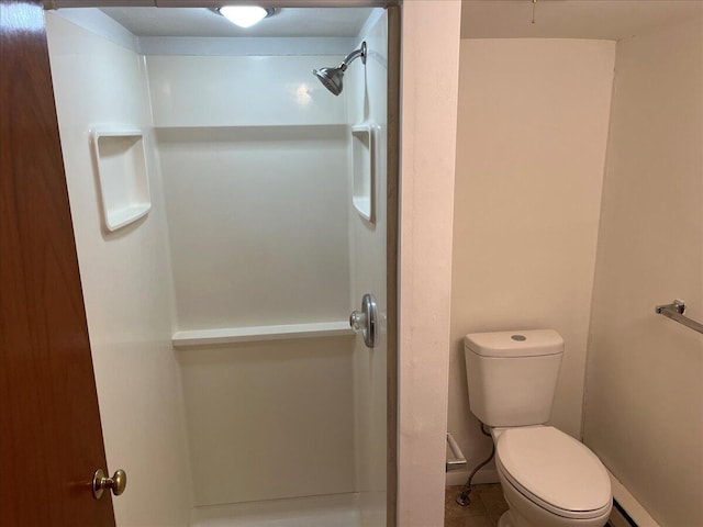 253 Thomas Rd, Blakeslee, PA 18610 - bathroom featuring a shower, toilet, and tile patterned floors