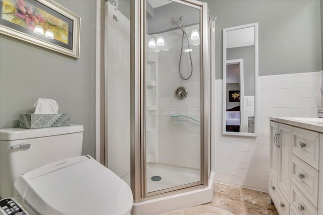 253 Thomas Rd, Blakeslee, PA 18610 - full bath featuring a stall shower, tile walls, toilet, and vanity