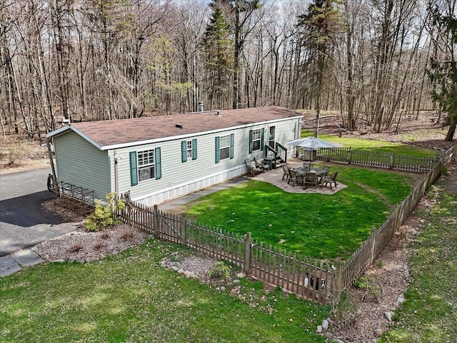 253 Thomas Rd, Blakeslee, PA 18610 - rear view of house with entry steps, a patio, and roof with shingles
