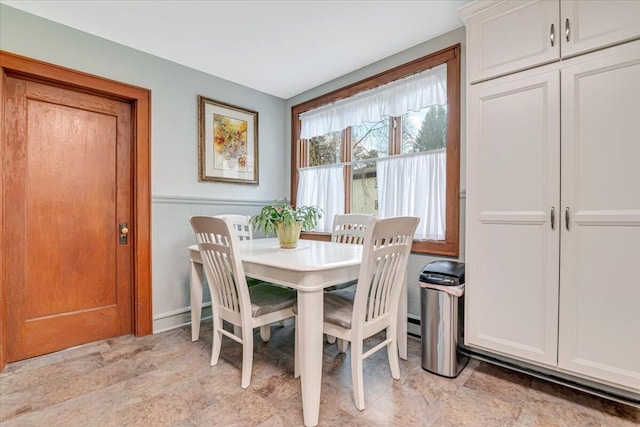 253 Thomas Rd, Blakeslee, PA 18610 - dining space with a wainscoted wall and light stone finish floors