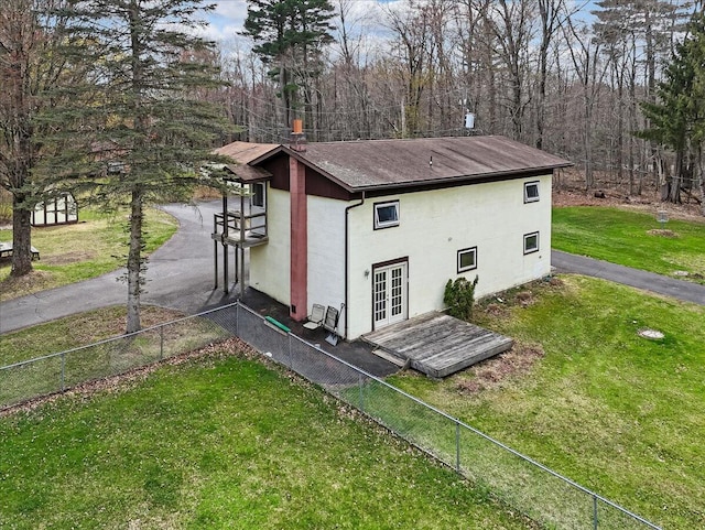 253 Thomas Rd, Blakeslee, PA 18610 - back of property with french doors and stucco siding